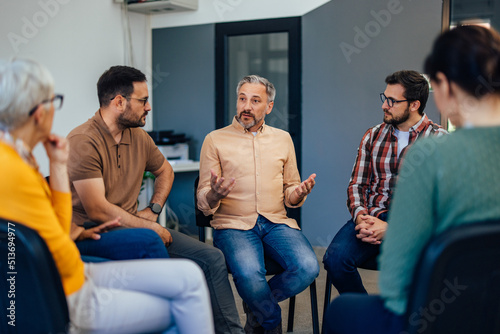 Картината върху платно Concentrated people talking to each other during the therapy, carefully listening to each other