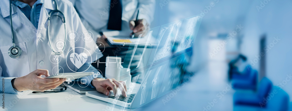 Medicine doctor using digital healthcare and network connection on hologram modern virtual screen interface icons, Medical technology futuristic concept. Medicine doctor using digital healthcare and network connection on hologram modern virtual screen interface icons, Medical technology futuristic concept.