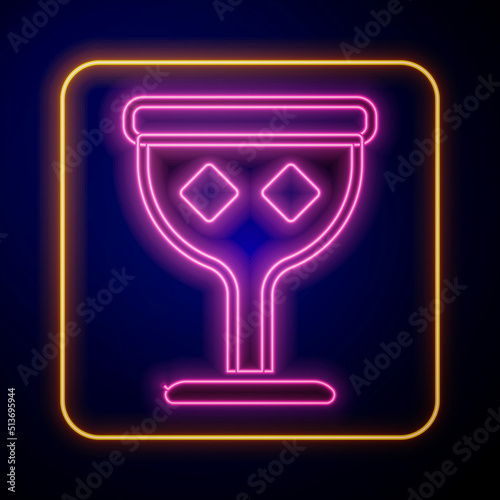 Glowing neon Medieval goblet icon isolated on black background. Holy grail. Vector