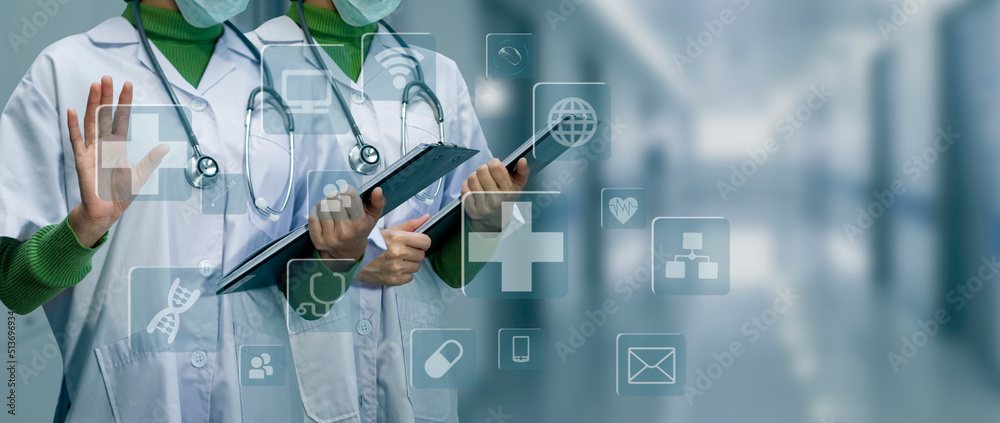 Medicine doctor using digital healthcare and network connection on hologram modern virtual screen interface icons, Medical technology futuristic concept. Medicine doctor using digital healthcare and network connection on hologram modern virtual screen interface icons, Medical technology futuristic concept.