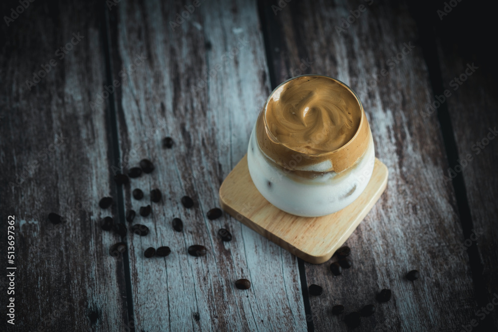 Ice dalgona coffee. Milk and foamy whipped coffee. Trend drink. Ice dalgona coffee. Milk and foamy whipped coffee. Trend drink.