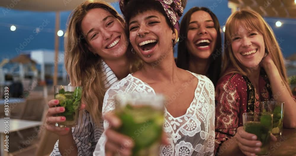 Happy multiracial girls having fun at beach party outdoor 