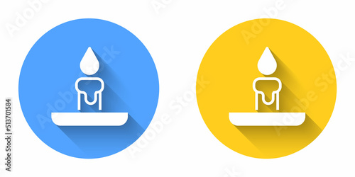 White Burning candle in candlestick icon isolated with long shadow background. Cylindrical candle stick with burning flame. Circle button. Vector