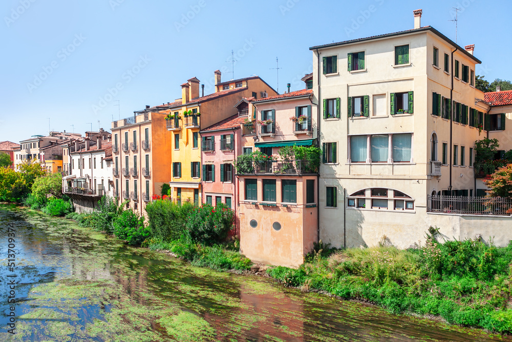 Houses and water channel . Waterfront residential district in Padua Italy 