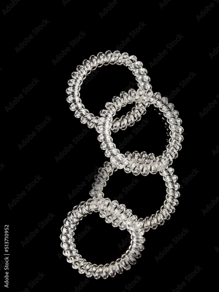 Elastic bands hair clips multi-colored on a white background Elastic bands hair clips multi-colored on a white background