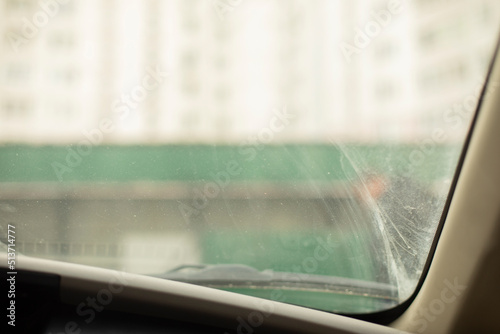 Window in car. Dirty glass in transport.