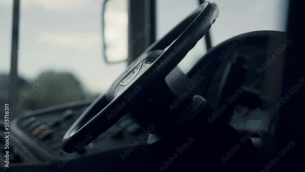 School bus black helm without chauffeur close up. Handlebar on schoolbus cabin. School bus black helm without chauffeur close up. Handlebar on schoolbus cabin.