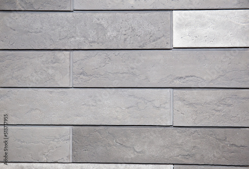 Gray brick wall close up. Background of brick wall