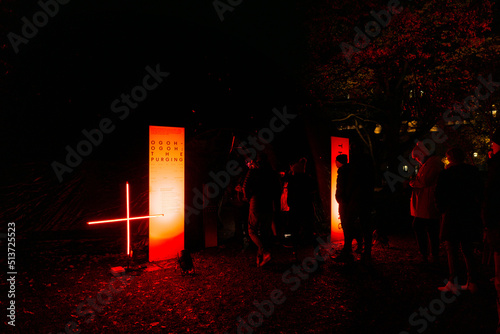 Dark MOFO 2022 sign board for purging event with line