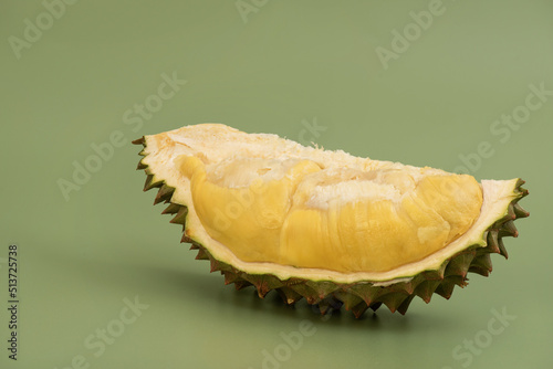 Durio or Durian fruit isolated on green background. photo