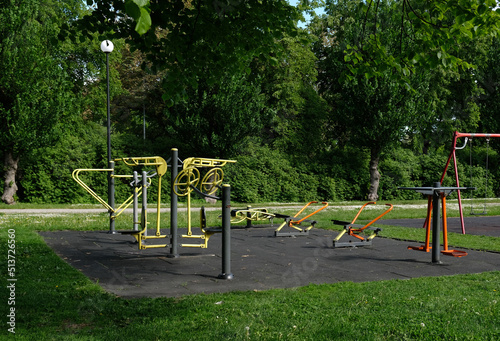 Urban sports ground with weight training and exercise equipment for sports. Sports and recreation area. Empty sports ground outdoor workout in a park.