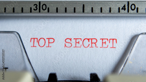 Foto Typing top secret on an old electric typewriter