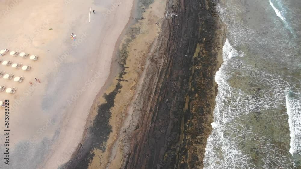 Spanish landscapes. Top view. Aerial view on sandy volcanic beach. Spanish landscapes. Top view. Aerial view on sandy volcanic beach.