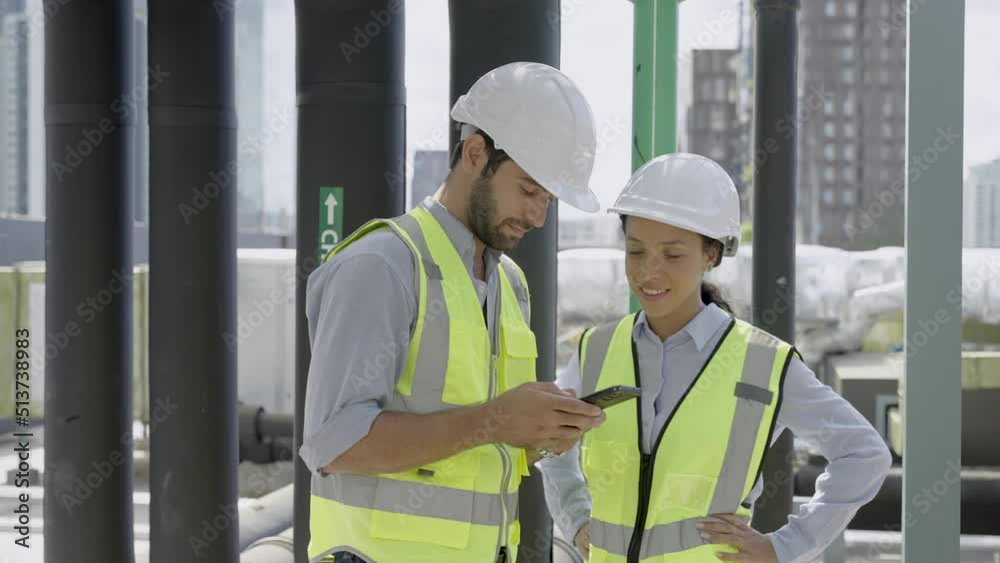 Technician working and inspecting the pipeline in factory Technician working and inspecting the pipeline in factory