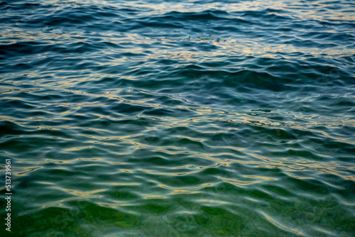 Detail of sea water color with green bluish gradient