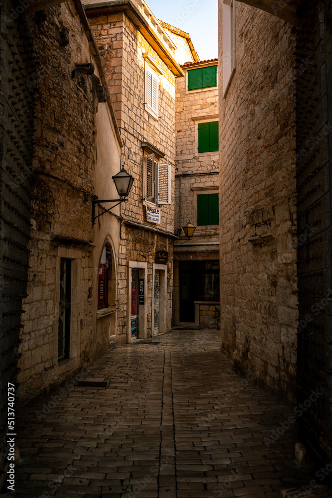 Empty morning streets in mediteranean historical city Trogir in Croatia