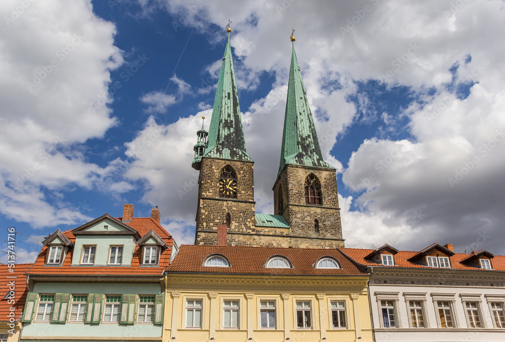 Church towers over a row of houses in Quedlinburg, Germany