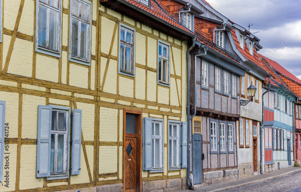 Street with colorful half timbered houses in Quedlinburg, Germany
