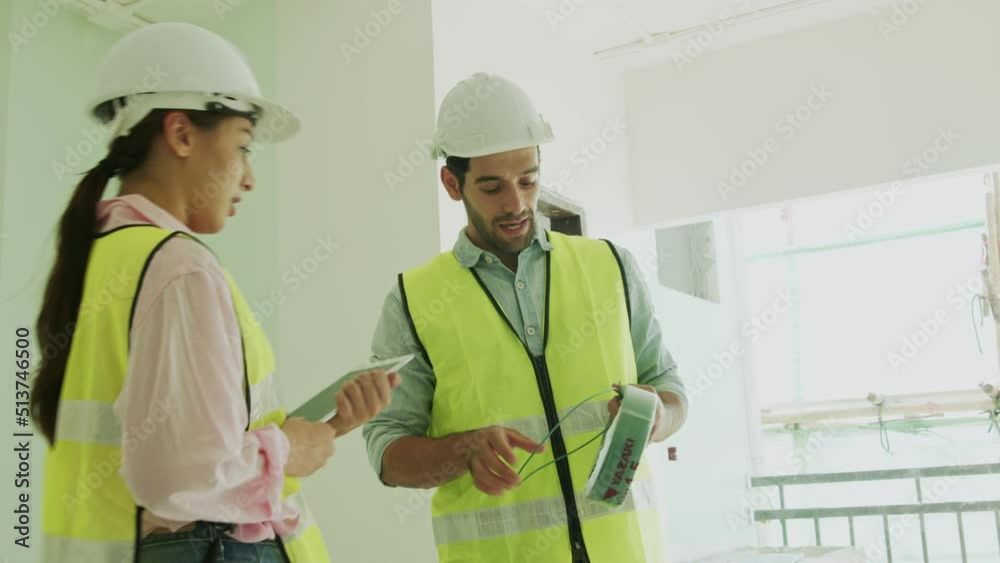 inspectors team or engineers are checking the work of the contractor in construction site by use tablet inspectors team or engineers are checking the work of the contractor in construction site by use tablet