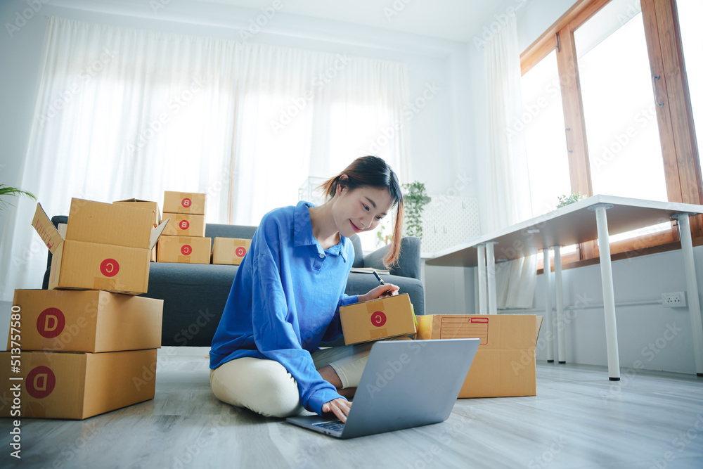 Small start-up business owners checking parcels at work, freelancers, salespeople, checking production orders. Pack products for delivery to customers Sell Ecommerce Shipping Ideas Small start-up business owners checking parcels at work, freelancers, salespeople, checking production orders. Pack products for delivery to customers Sell Ecommerce Shipping Ideas