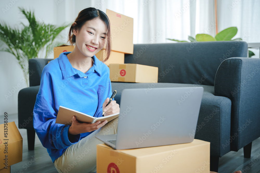 Small start-up business owners checking parcels at work, freelancers, salespeople, checking production orders. Pack products for delivery to customers Sell ​​Ecommerce Shipping Ideas