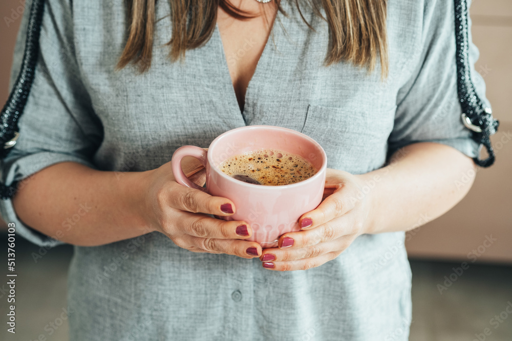 Close Up Photo of Woman Hands Holding Pink Cup of Coffee at Home
