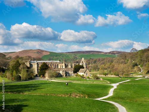 The ruins of the Augustinian Bolton Priory in the Wharfe valley at Bolton Abbey, North Yorkshire, England photo