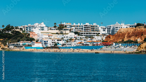 View of Beach of Olhos de Agua from the sea in the southern Portuguese region of Algarve, Portugal photo