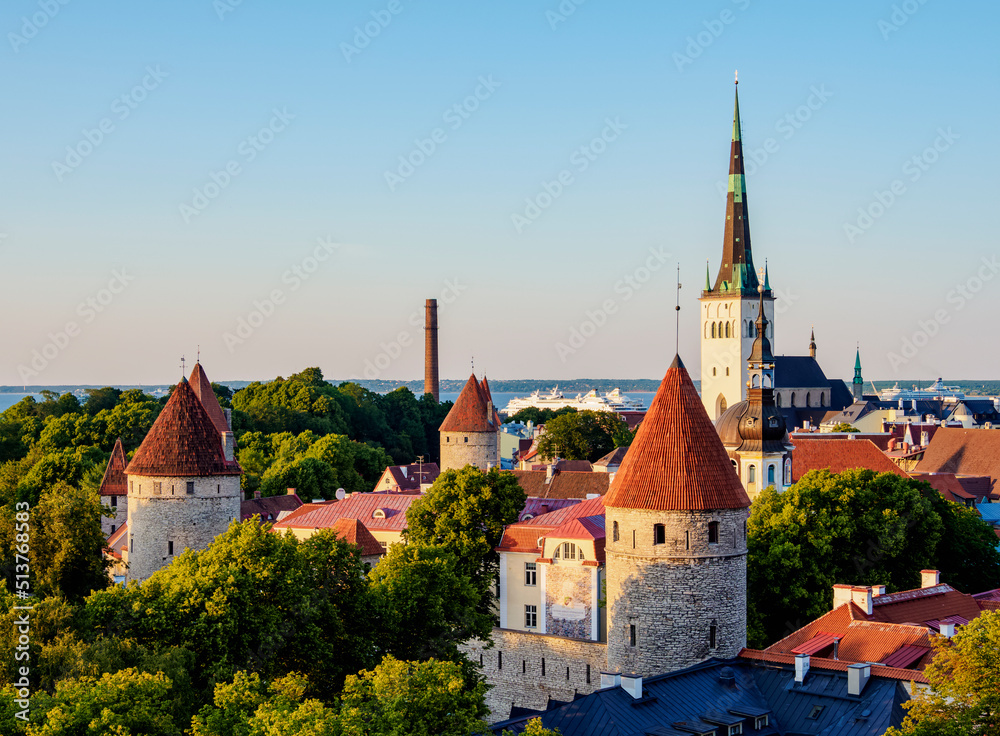 View over the Old Town towards St. Olaf's Church at sunset, UNESCO World Heritage Site, Tallinn, Estonia View over the Old Town towards St. Olaf's Church at sunset, UNESCO World Heritage Site, Tallinn, Estonia
