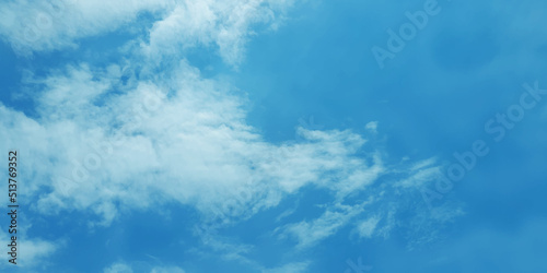 Abstract shinny and fresh summer sky background with clouds, cloudy natural blue sky background for creative design and wallpaper.