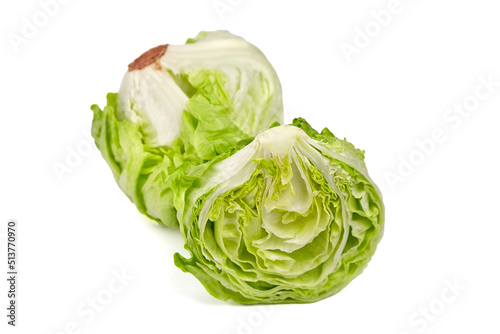 Iceberg lettuce head and half, fresh leafy green vegetable isolated on white © mikeosphoto