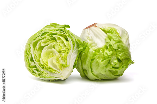 Iceberg lettuce head and half, fresh leafy green vegetable isolated on white