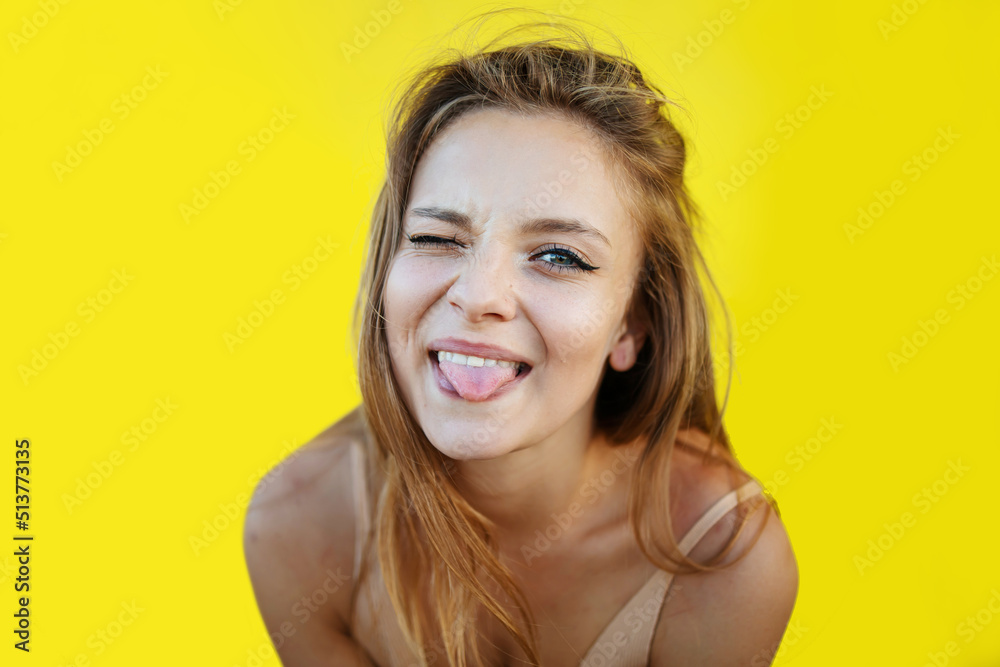 Silly Blonde Woman Making Funny Face Positive Girl Acts On The Camera Blinks Sticks Out Her 