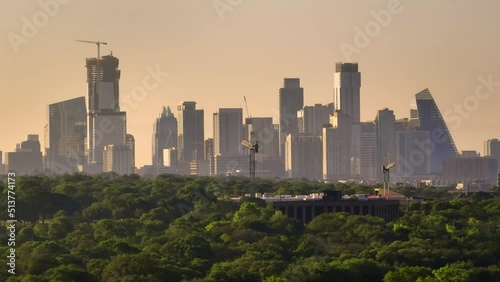Downtown Austin skyline aerial drone helicopter pan right during summer sunrise in 2022 photo
