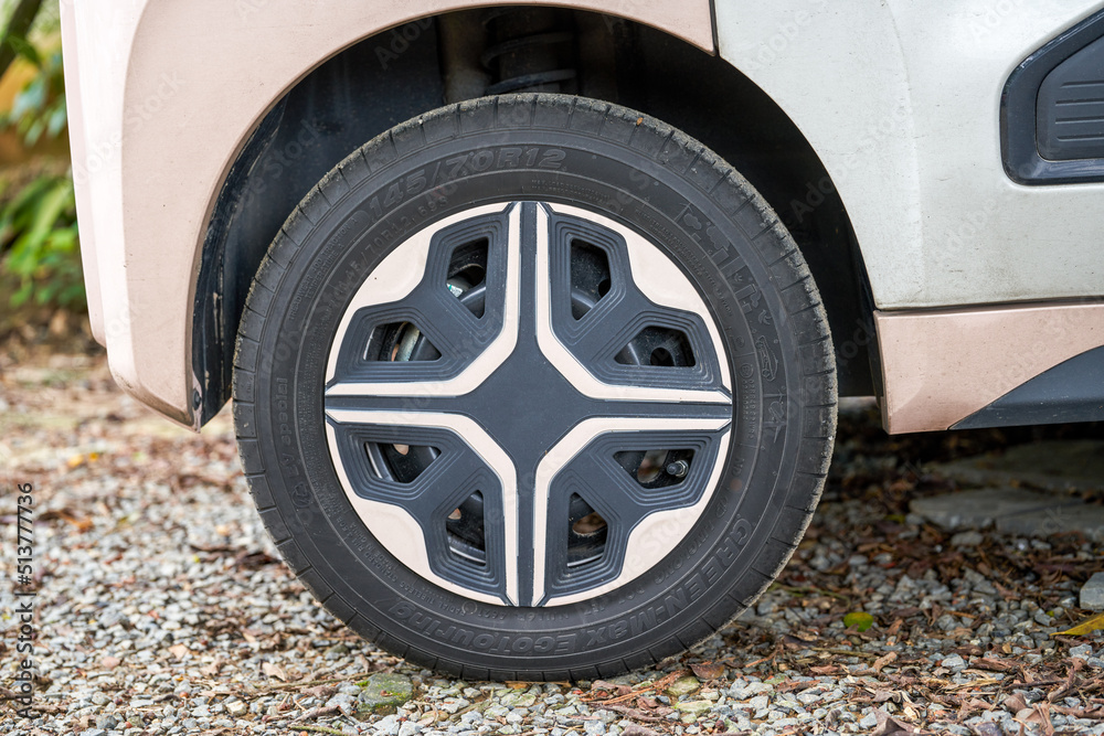 Close-up of the wheels of a small electric car