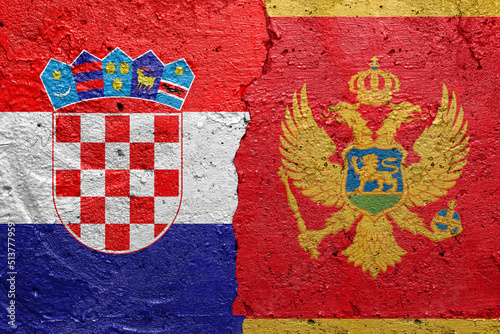 Croatia and Montenegro - Cracked concrete wall painted with a Croatian flag on the left and a Montenegrin flag on the right stock photo photo