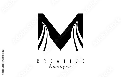 Black letter M logo with leading lines and road concept design. Letter M with geometric design.