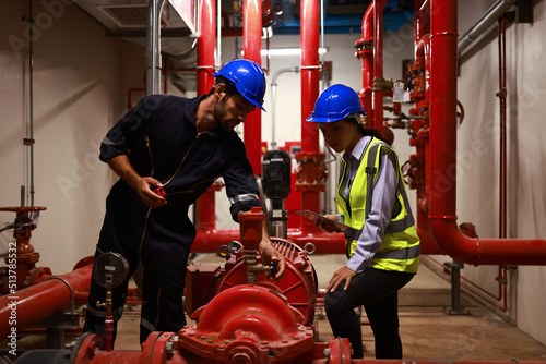 System engineer and Technician check fire Extinguishing System Piping and Pump