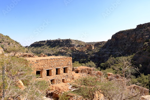 View of ruins of an abandoned village at the Wadi Bani Habib at the Jebel Akhdar mountain in Oman photo