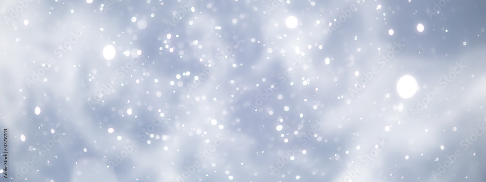 Fototapeta premium blue snowfall bokeh background, abstract snowflake background on blurred abstract blue