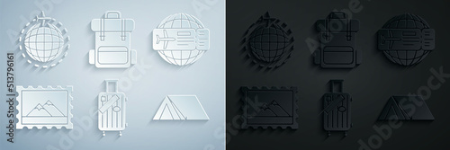 Set Suitcase for travel and stickers, Airline ticket, Postal stamp Mountains, Tourist tent, Hiking backpack and Globe with flying plane icon. Vector