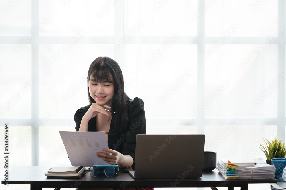 Happy smiling business woman using laptop for working and study at home or office space. Happy smiling business woman using laptop for working and study at home or office space.