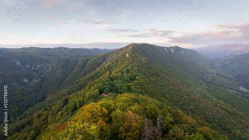 Mountain ridge in dense forest catching last light of the day during autumn sunset,Slovakia, Europe © Peter Kolejak