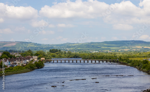 Beautiful Limerick urban cityscape over the river Shannon viewed from King John's Castle photo