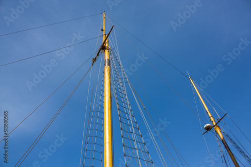 Mast of a ship in front of blue sky