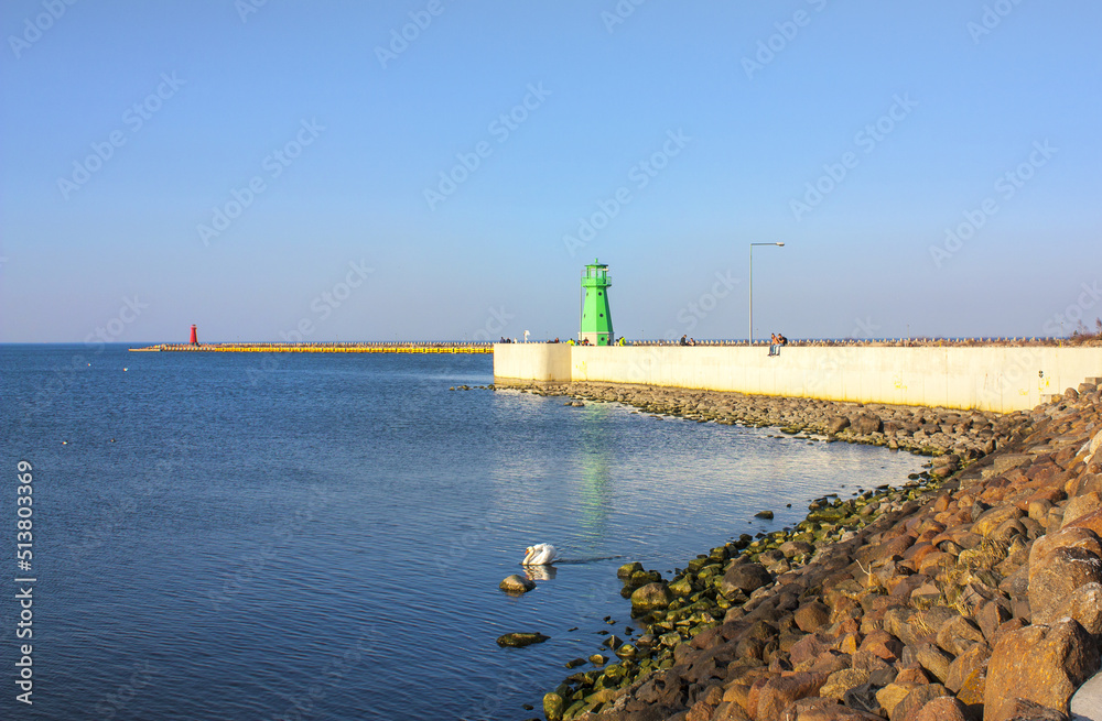 Beautiful Baltic Sea beach with lighthouse in Gdansk, Poland	
