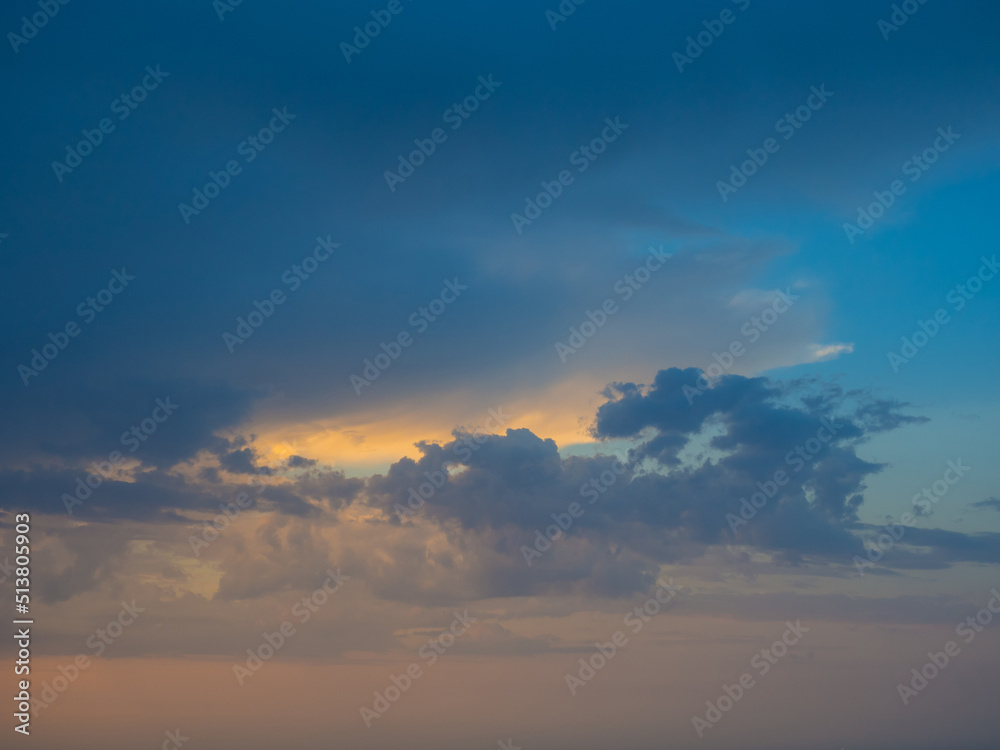 Morning sky with clouds after thunderstorm. Background with different shades of blue, cyan and gray colors.