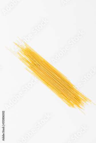Raw pasta spaghetti isolated at white background