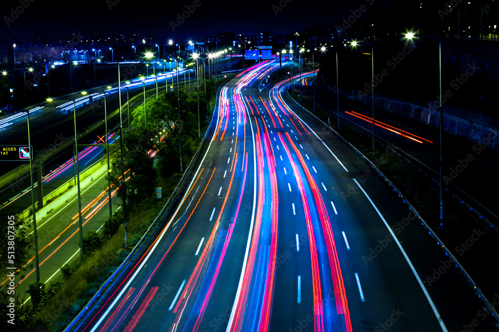 Night view of traffic entering Barcelona, traces of cars.