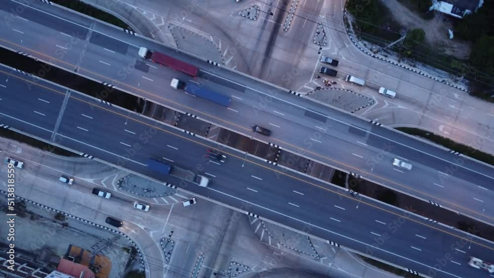 Traffic on the main road during evening twilight, Aerial view Traffic on the main road during evening twilight, Aerial view